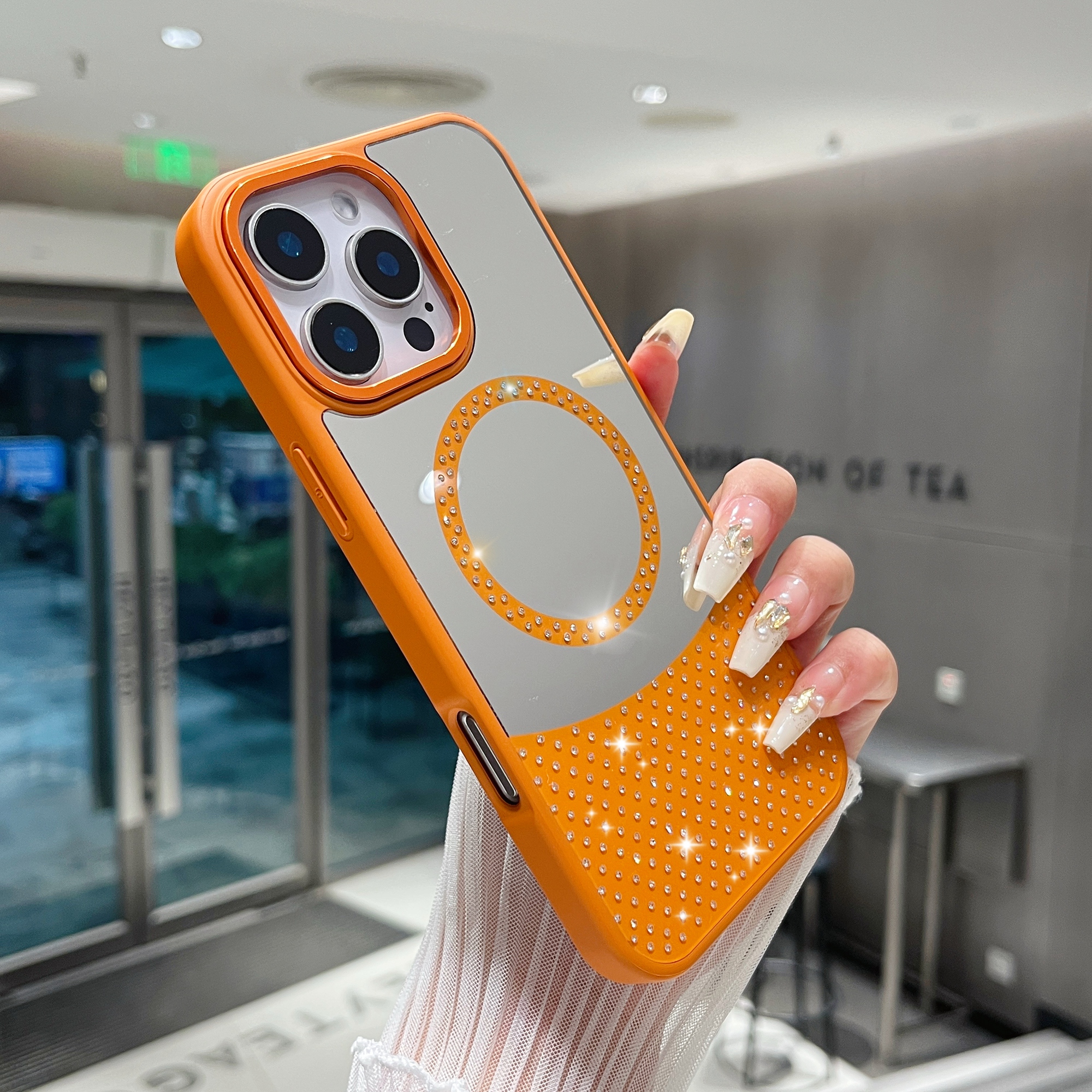 For iPhone 16 Pro Magnetic Case Mirror Surface TPU + PC Shockproof Phone Cover - Orange