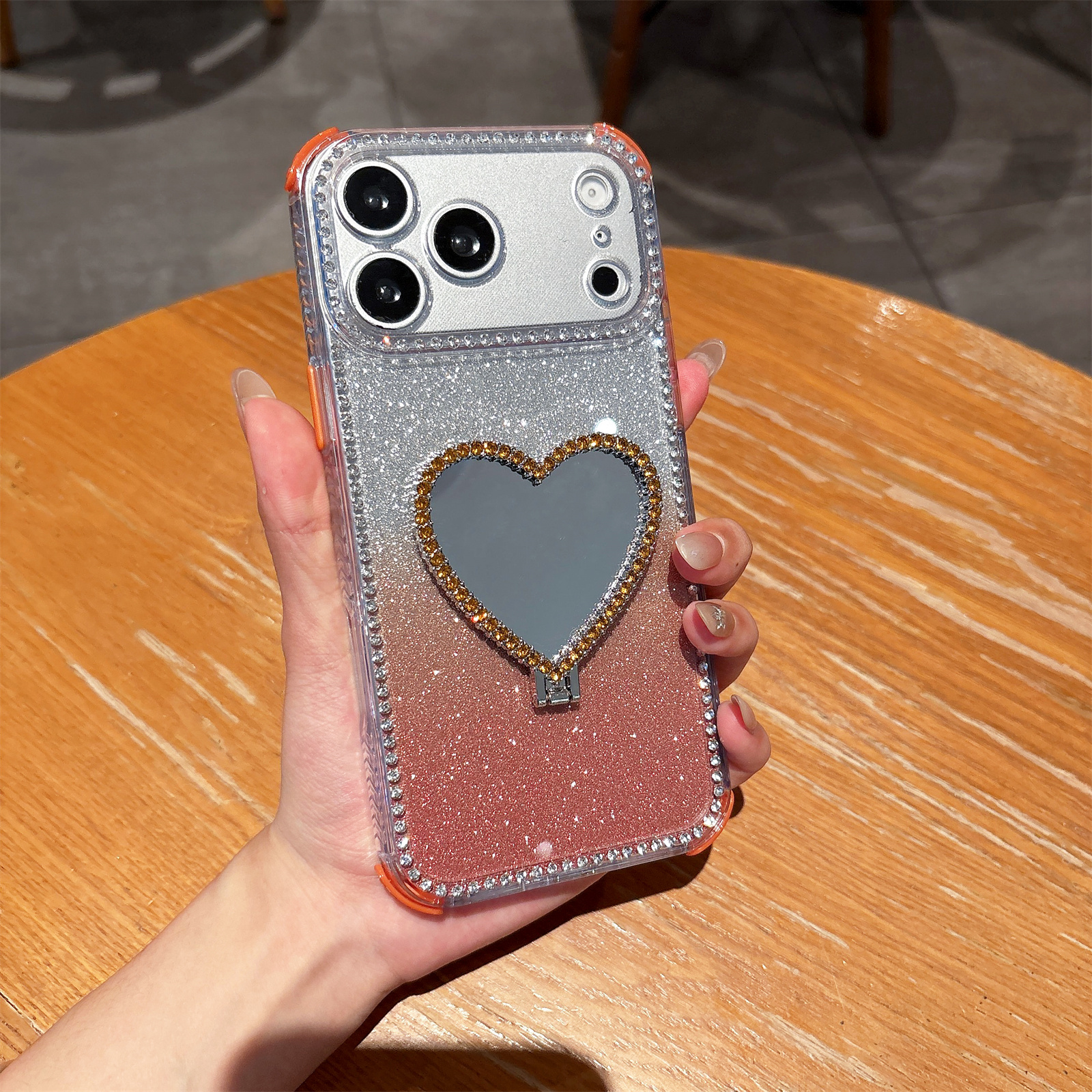 For iPhone 17 Pro Case with Heart Shape Kickstand 2 in 1 Rhinestone Glitter PC TPU Shockproof Cover - Orange