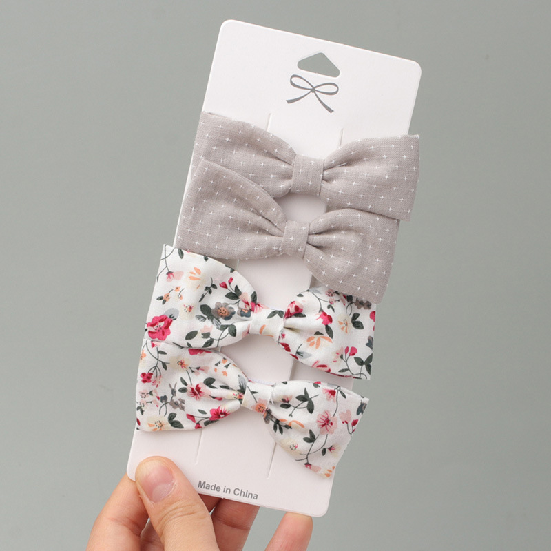 

CN 4pcs/set Baby Girls Hair Bow Clips Süße Nicht-schlupf-bögen Clip Hair Barrettes Accessoires Für Säuglinge Kleinkind Kinder - Stil 1